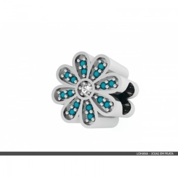 Berloque flor 8 petalas em prata com petalas zirconia azul turquesa e miolo cristal. 361486